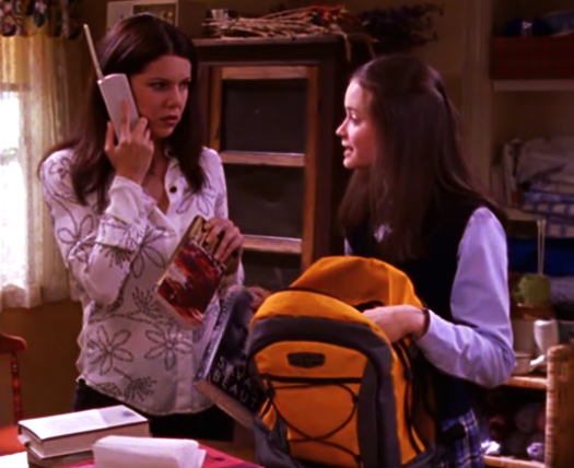 Rory loading up her school bag as Lorelai looks on concerned