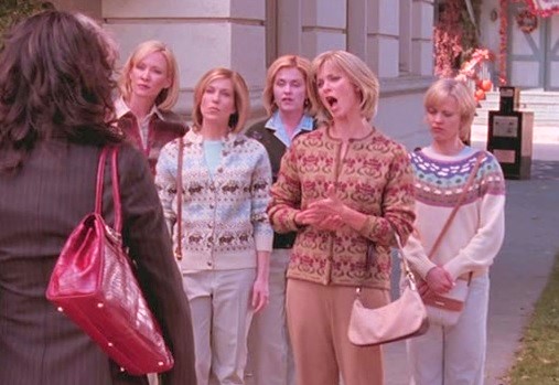 The terrifyingly banal cardigan- and handbag-toting Stepford moms chastise Lorelai