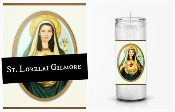 A jar candle emblazoned with a picture of Lorelai dressed as a saint