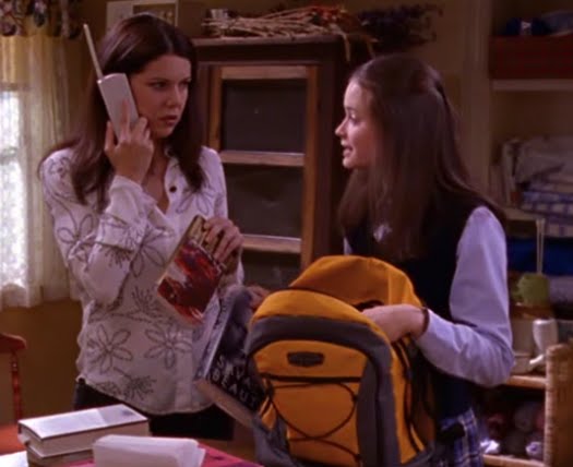 Rory loading up her school bag as Lorelai looks on concerned