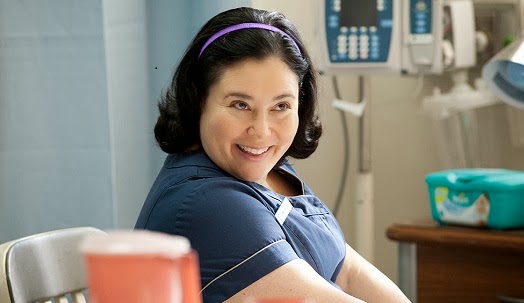 Alex Borstein giving cheeky nurse in Getting On