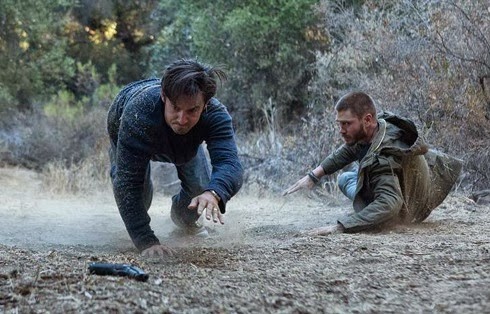 Milo Ventimiglia and Chad Michael Murray squabble over a gun in Chosen