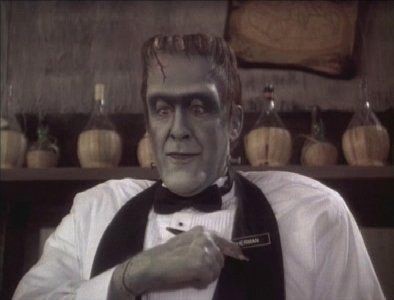 Edward Herrmann unrecogniseably grey as Herman Munster