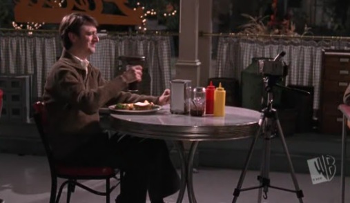 Kirk raises a glass to his imaginary pre-date